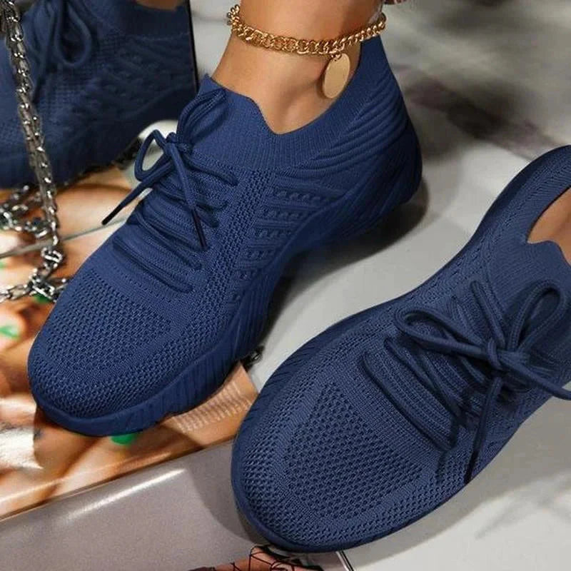 Overhead view of orthopedic lightweight walking sneakers showing breathable mesh construction and modern silhouette