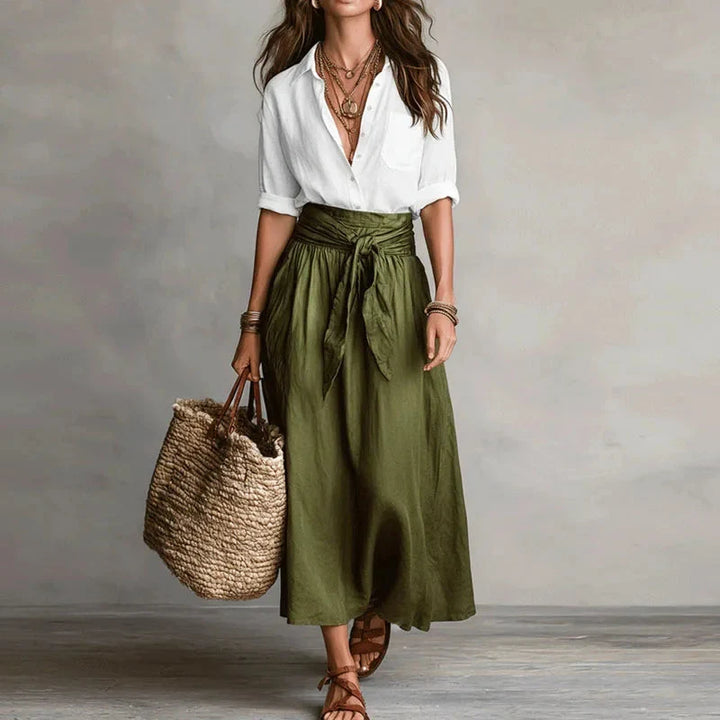 Two-piece coordinated set with rolled sleeve shirt and below-the-knee length skirt for versatile styling