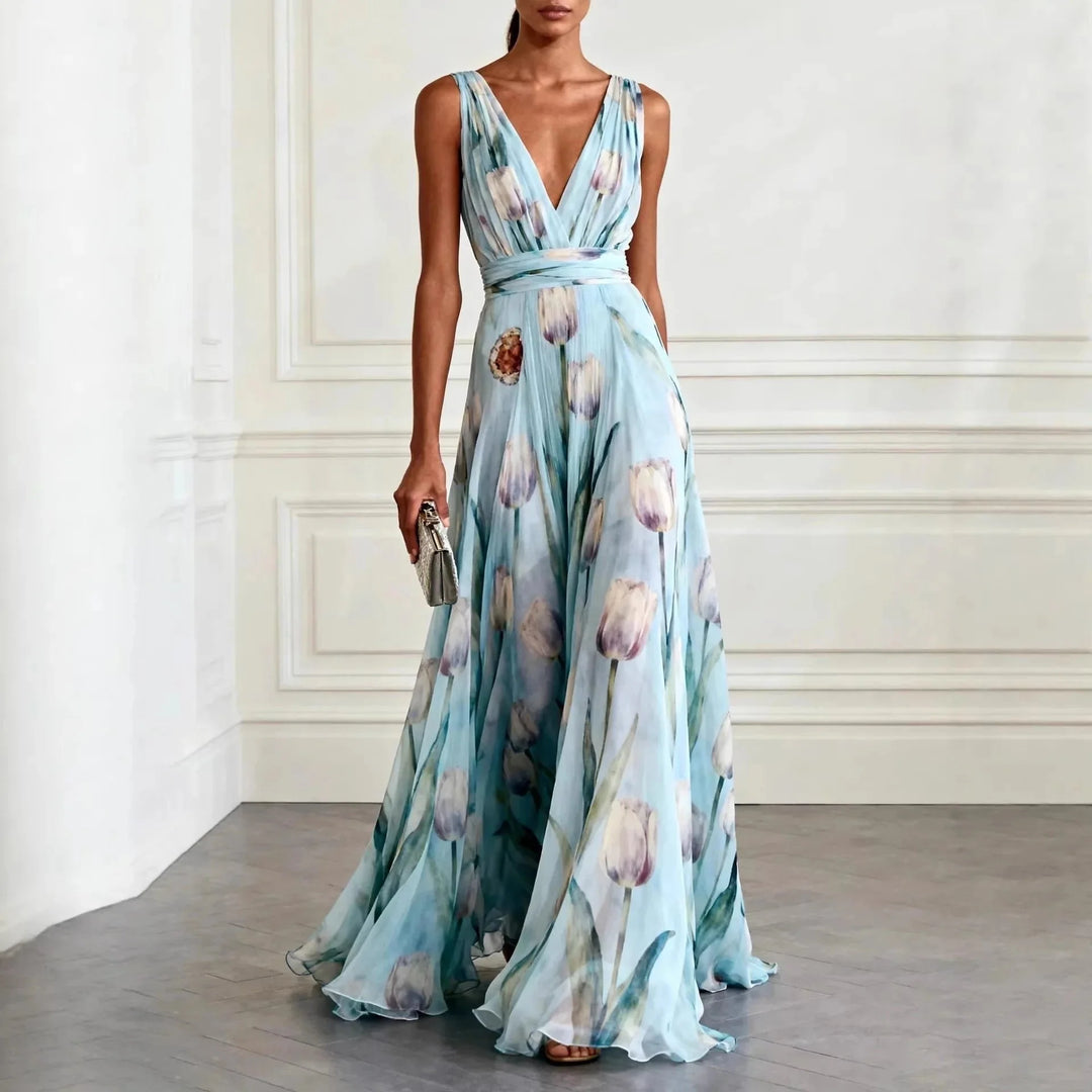 Floral maxi wrap dress with deep V-neckline and adjustable waist tie in botanical print