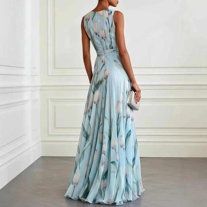 Close-up detail of floral print pattern and wrap bodice construction on maxi dress