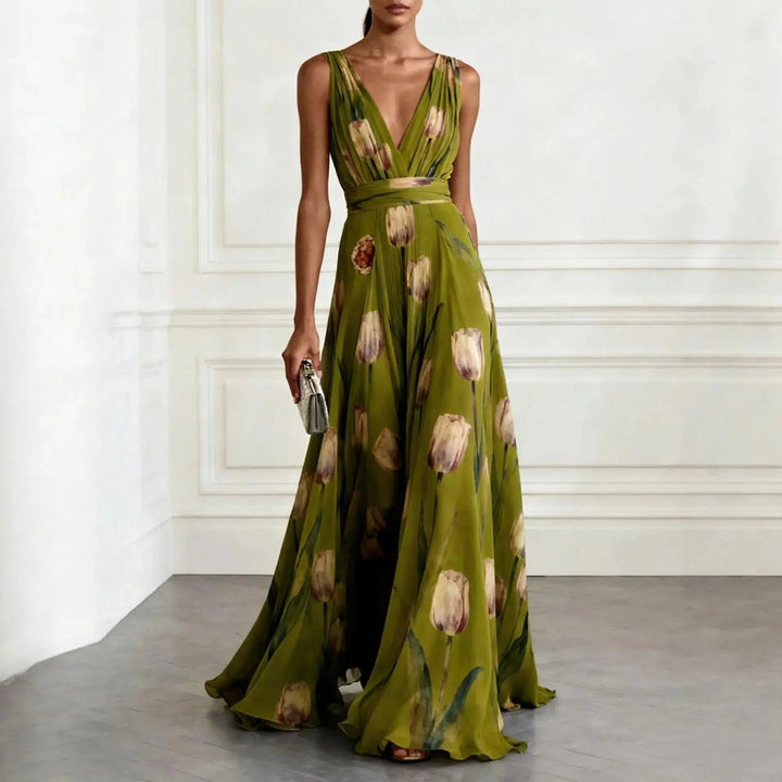 Detail of V-neckline and wrap closure on lightweight pleated maxi dress