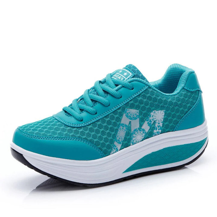 Close-up of orthopedic sneaker contoured insole with shock-absorbing cushioning for all-day support