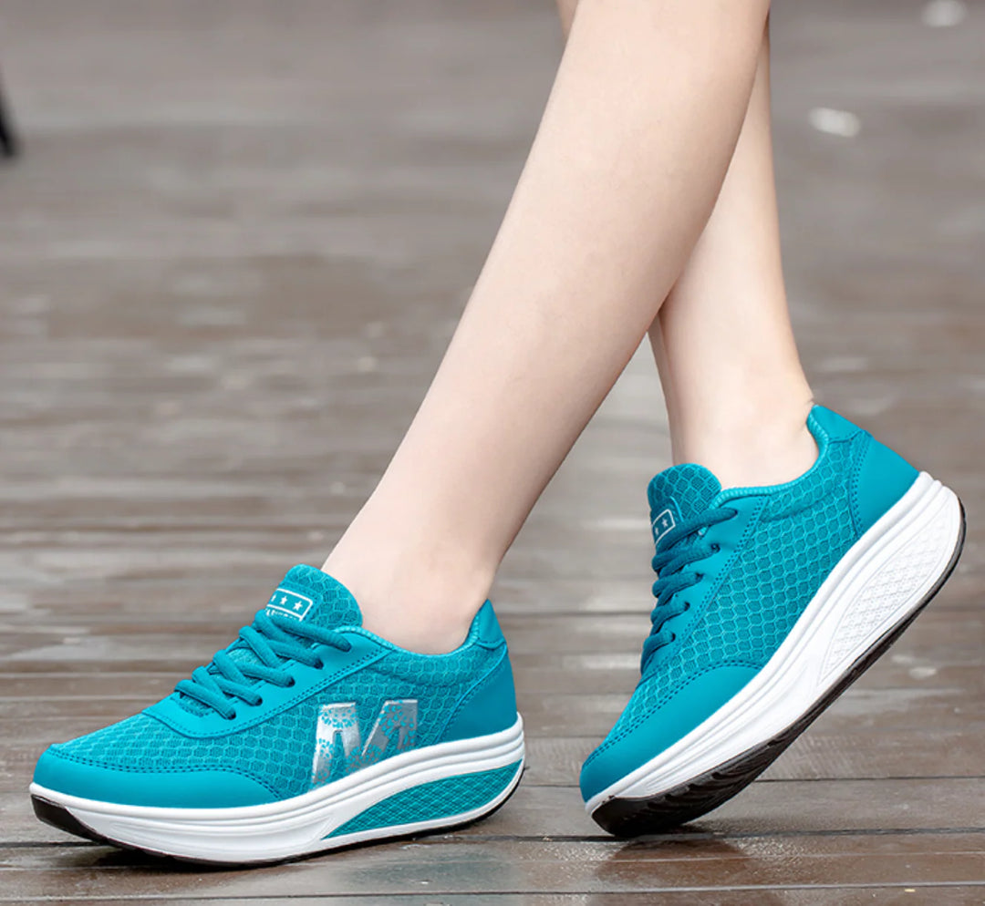 Orthopedic corrector sneakers featuring breathable mesh construction and supportive midsole design