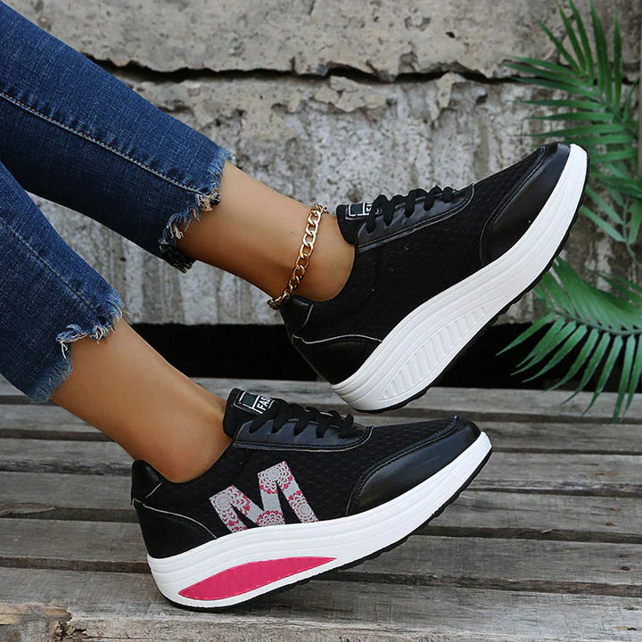 Breathable mesh upper on orthopedic walking sneakers with decorative logo detail